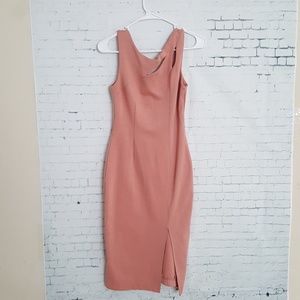 Pencil dress with a slit . Used no tag